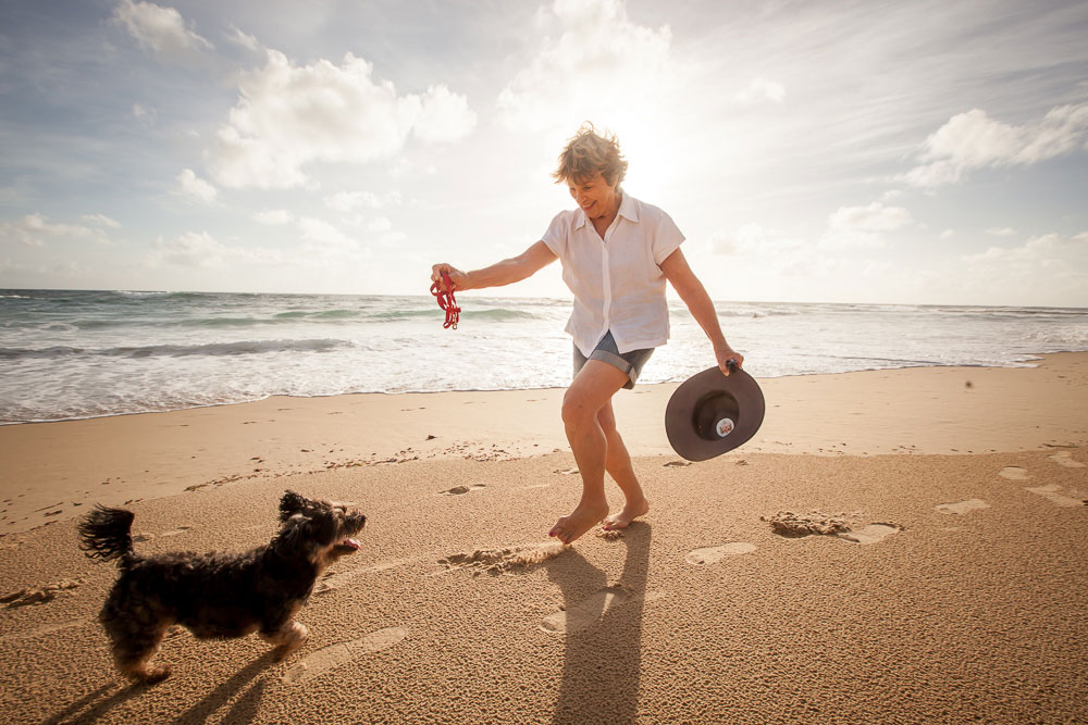 Lady with dog doing balance exercsises